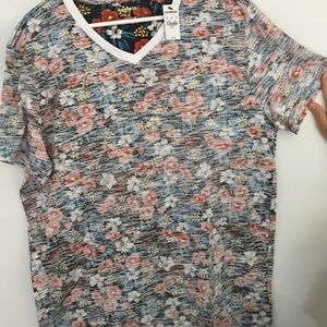 Express shirt with flowers on it